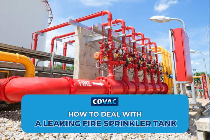Red fire sprinkler tank, serving as a visual aid for managing leaks in fire sprinkler tanks.